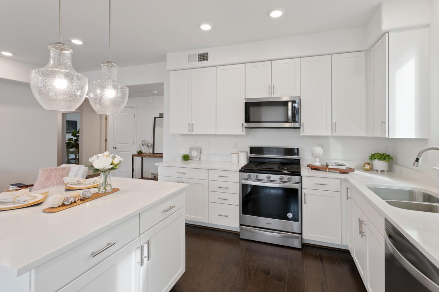 1435 Nightshade Road, Unit 30 Milpitas, CA 95035 - Photo 5 of 16 a kitchen with a sink stove and microwave