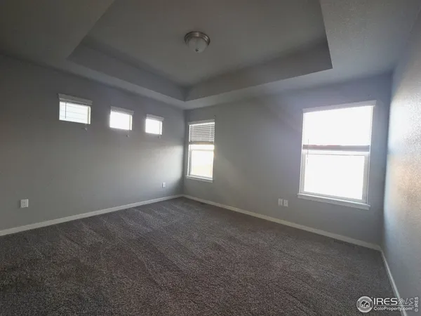 an empty room that has a window