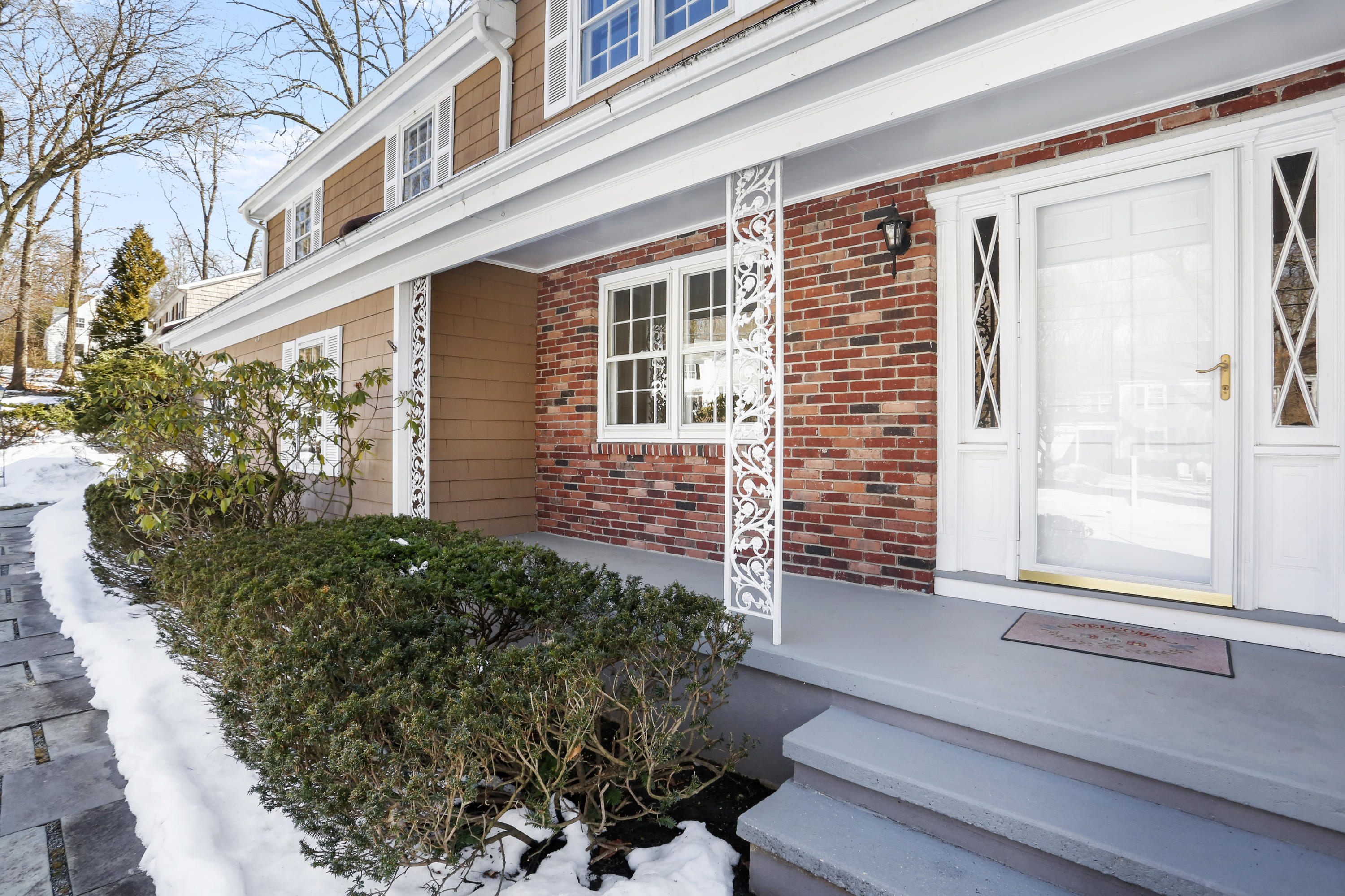 22 Miller Road Darien, CT 06820 - Photo 3 of 33 Flagstone walkway to covered front entry
