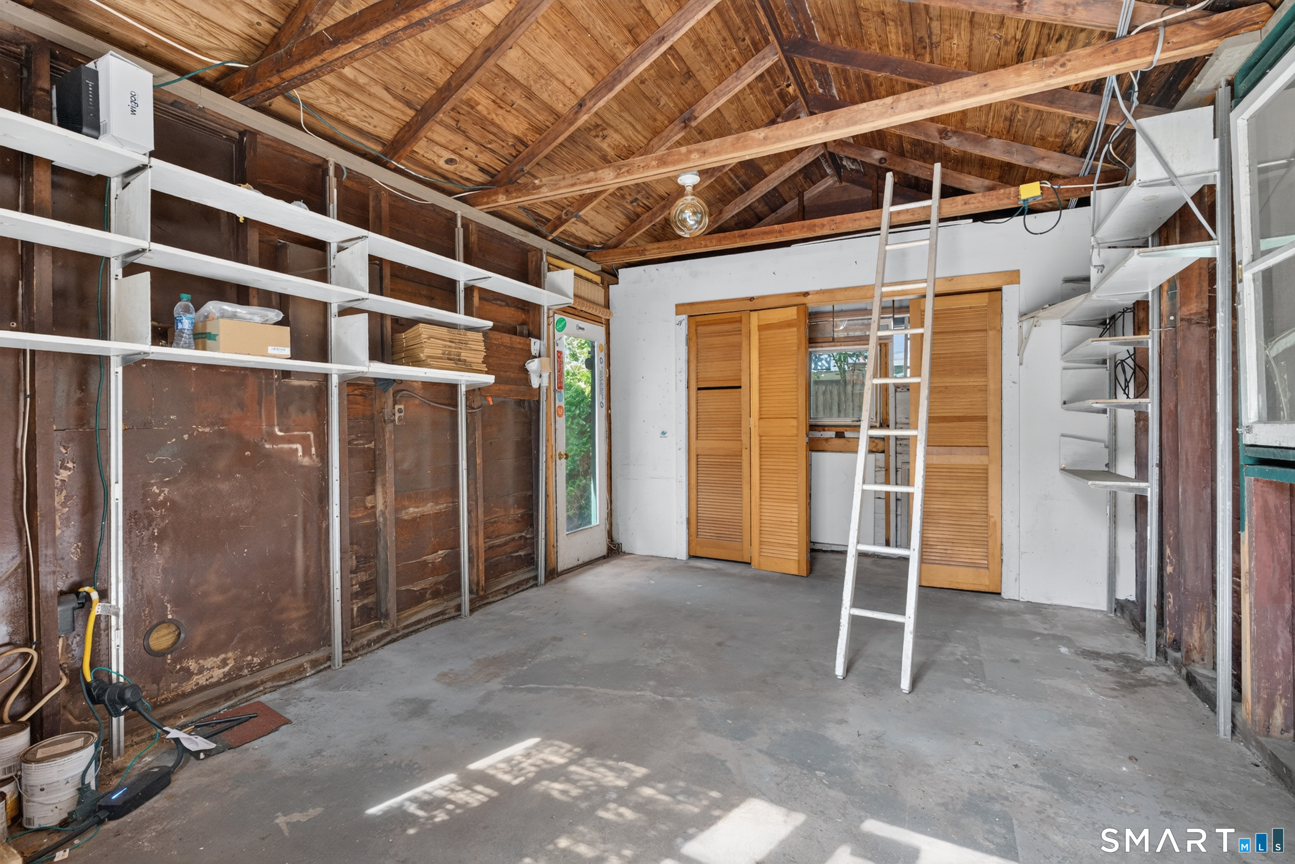 207 Pawson Road Branford, CT 06405 - Photo 35 of 39 Garage with electric car charger !