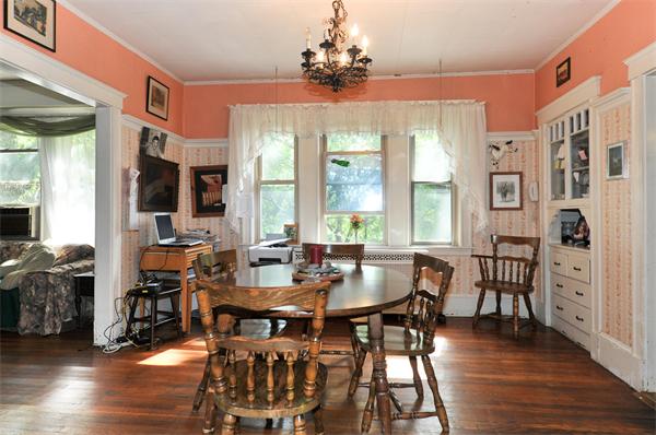 1 Payson Street Lexington, MA 02421 - Photo 4 of 14 a view of a dining room with furniture window and wooden floor