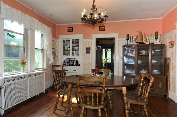 1 Payson Street Lexington, MA 02421 - Photo 5 of 14 a view of a dining room with furniture window and wooden floor