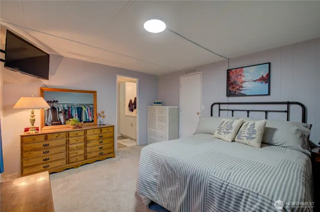 a bathroom with a tub sink and shower