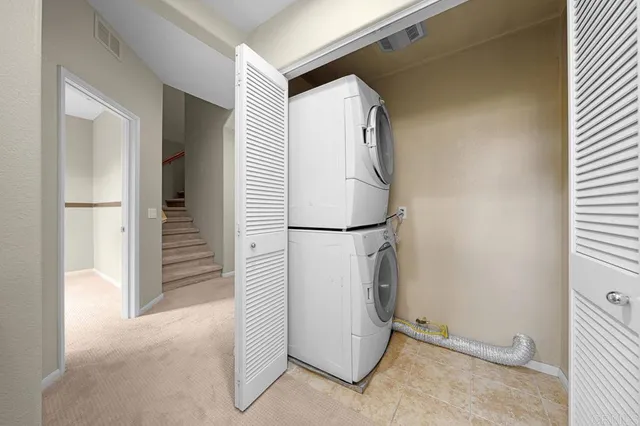 a view of a storage & utility room with washer and dryer