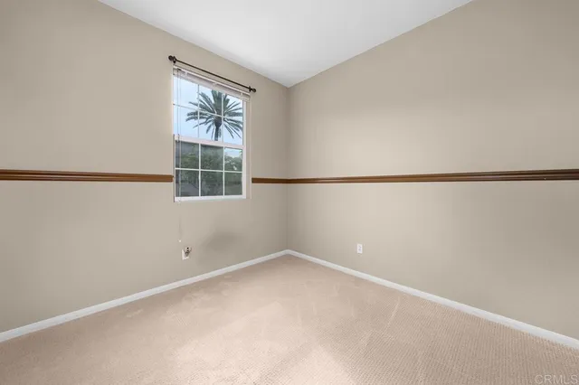 a bathroom with a sink toilet vanity and shower