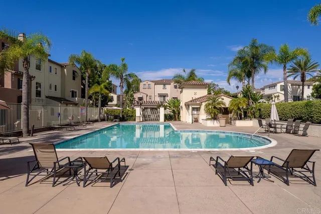 a view of a yard with palm trees