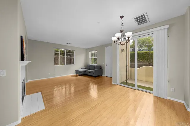 a bedroom with furniture and window