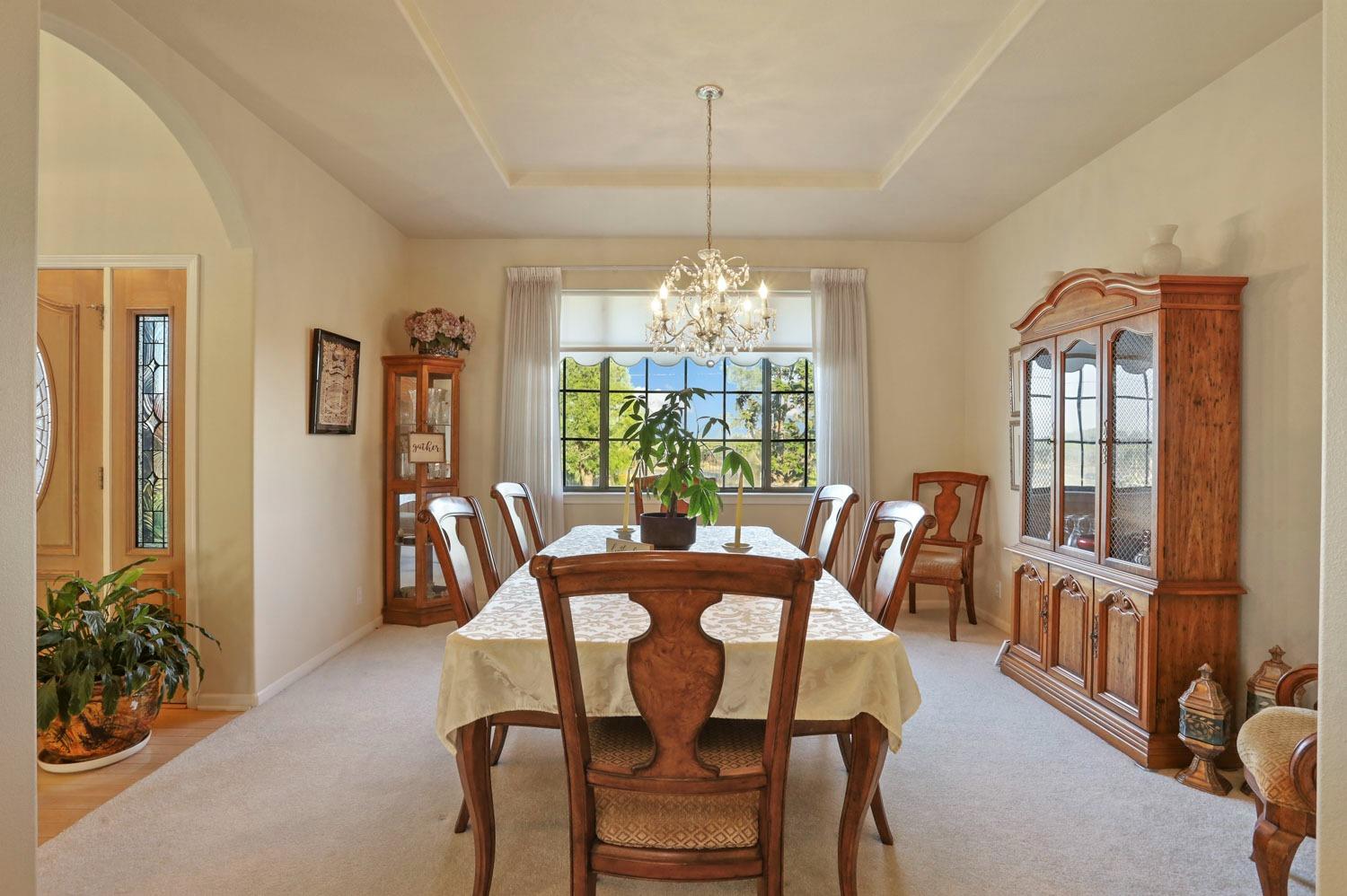 11791 Alpine Road Lodi, CA 95240 - Photo 15 of 74 a view of a dining room with furniture window and wooden floor
