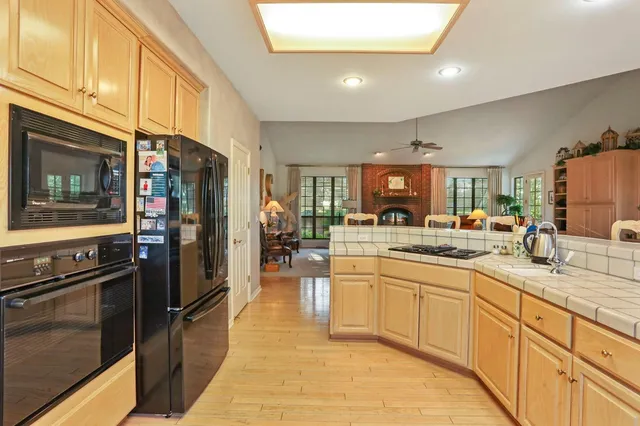 a living room with furniture and a gate