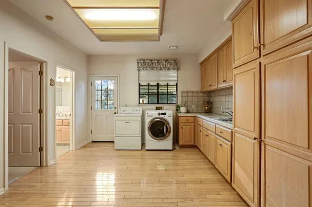 a bedroom with a bed and a cabinets