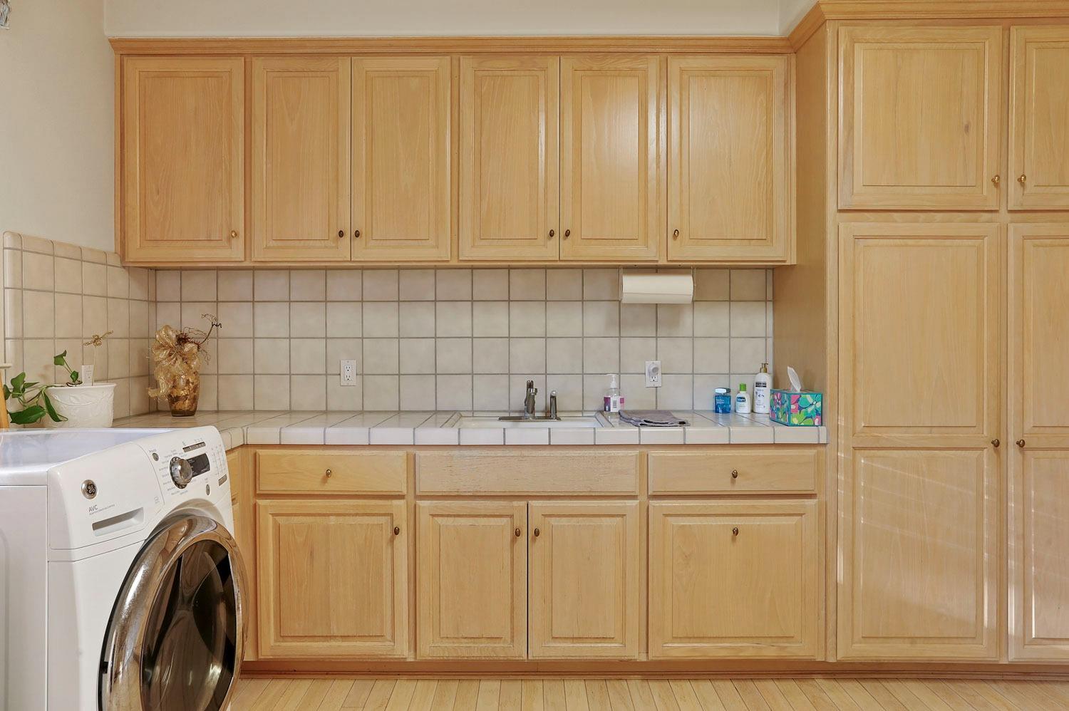 11791 Alpine Road Lodi, CA 95240 - Photo 34 of 74 a utility room with dryer and washer