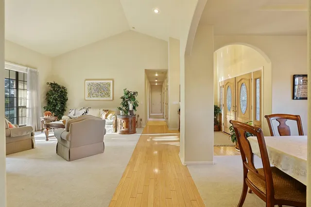 a spacious bedroom with a bed and a fireplace