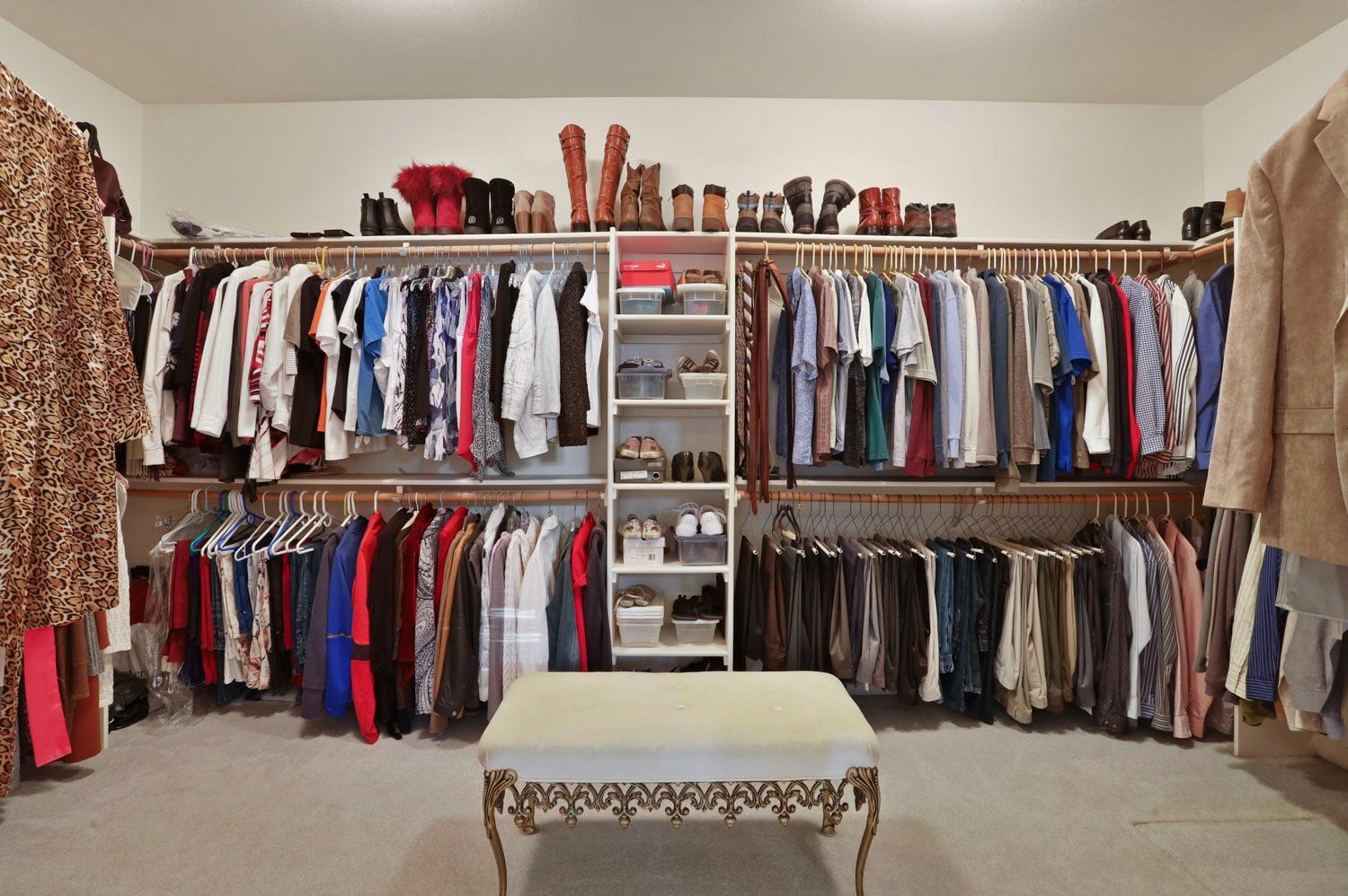 11791 Alpine Road Lodi, CA 95240 - Photo 51 of 74 a view of walk in closet with clothes
