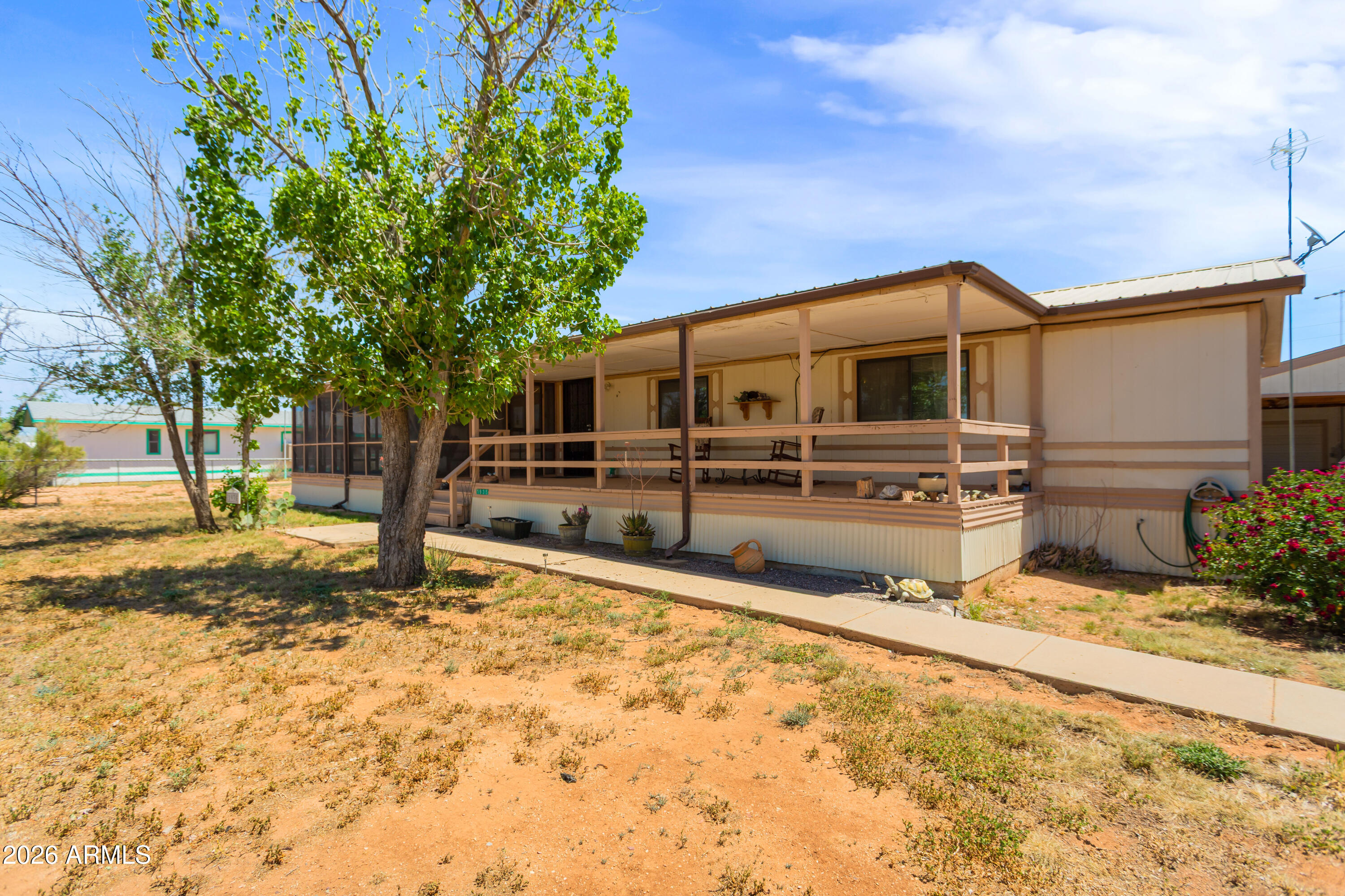 1935 North Tortoise Trail Dragoon, AZ 85609 - Photo 1 of 38 a view of a house with a backyard
