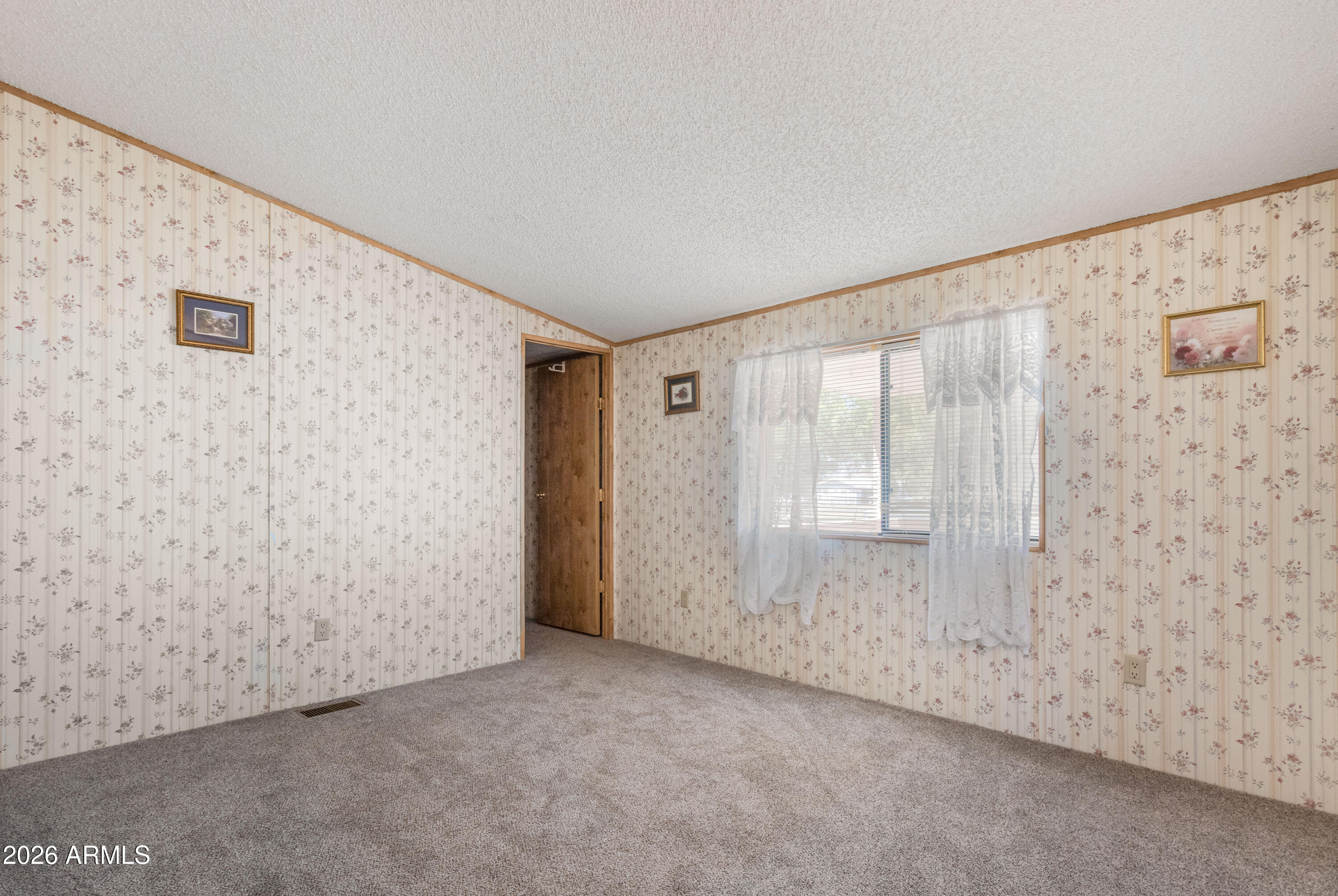 1935 North Tortoise Trail Dragoon, AZ 85609 - Photo 23 of 38 a view of an empty room with a window