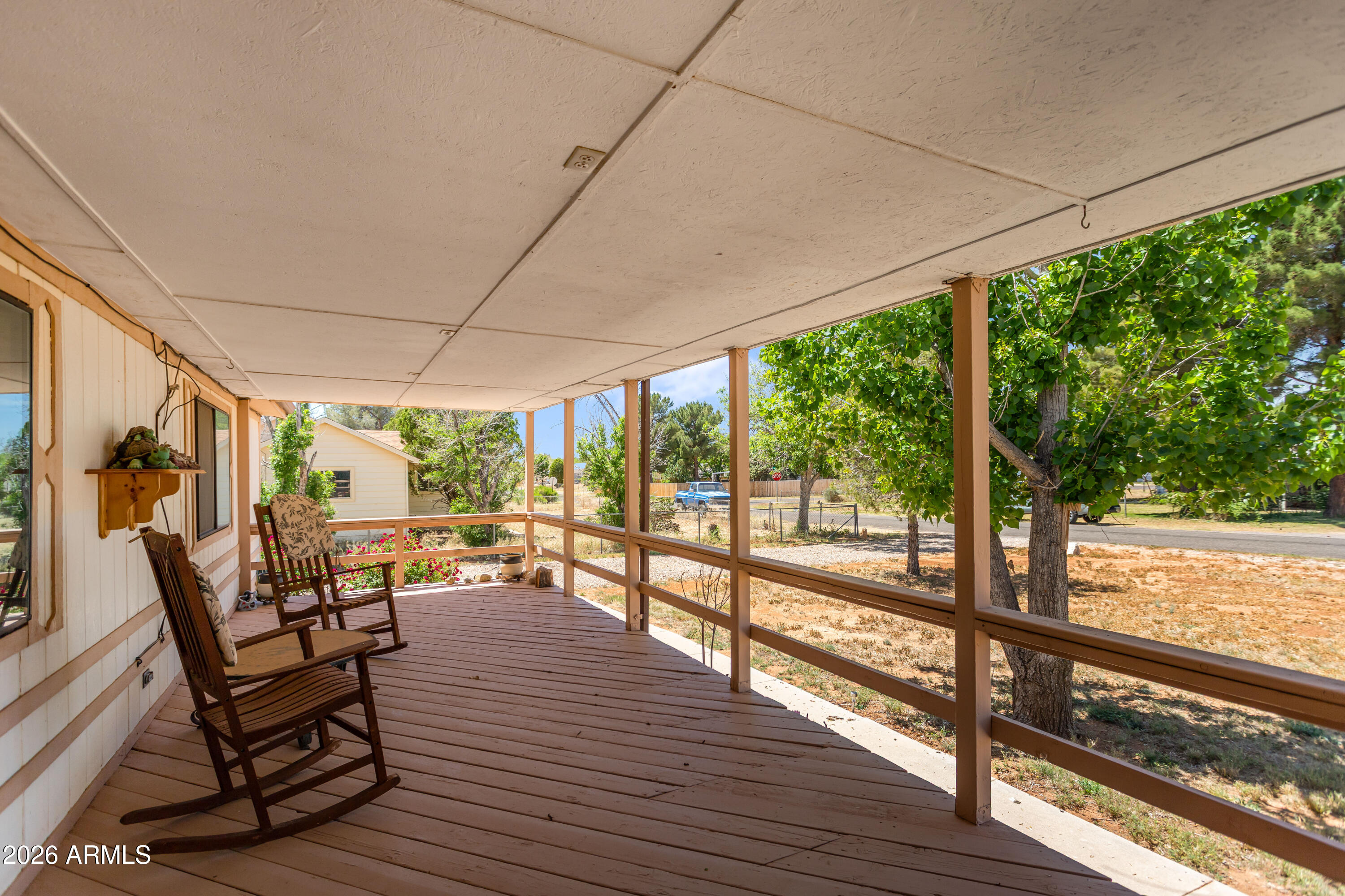 1935 North Tortoise Trail Dragoon, AZ 85609 - Photo 3 of 38 a view of a room with wooden floor and outdoor seating