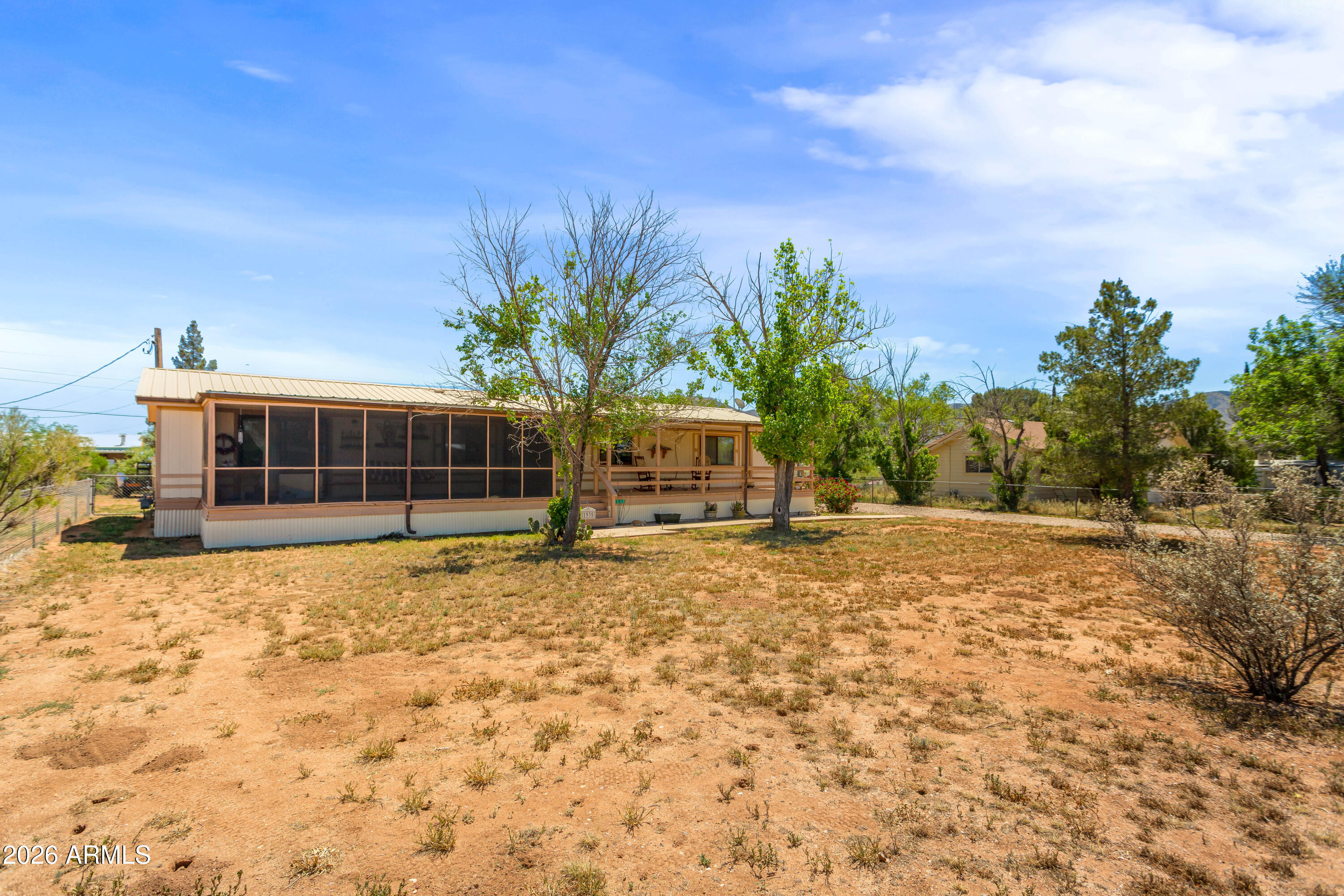 1935 North Tortoise Trail Dragoon, AZ 85609 - Photo 32 of 38 a house with trees in the background