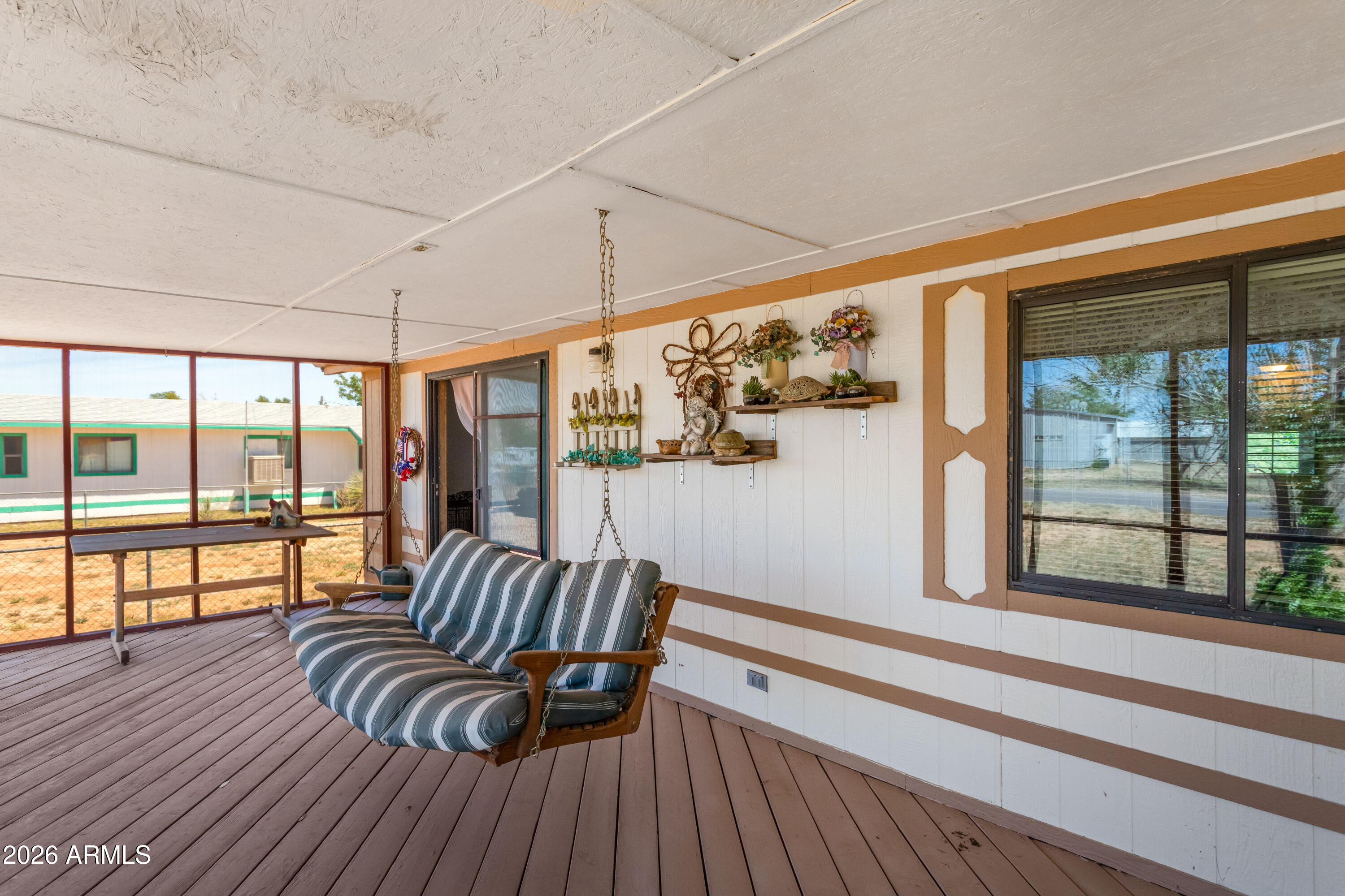 1935 North Tortoise Trail Dragoon, AZ 85609 - Photo 37 of 38 a living room with furniture and a large window