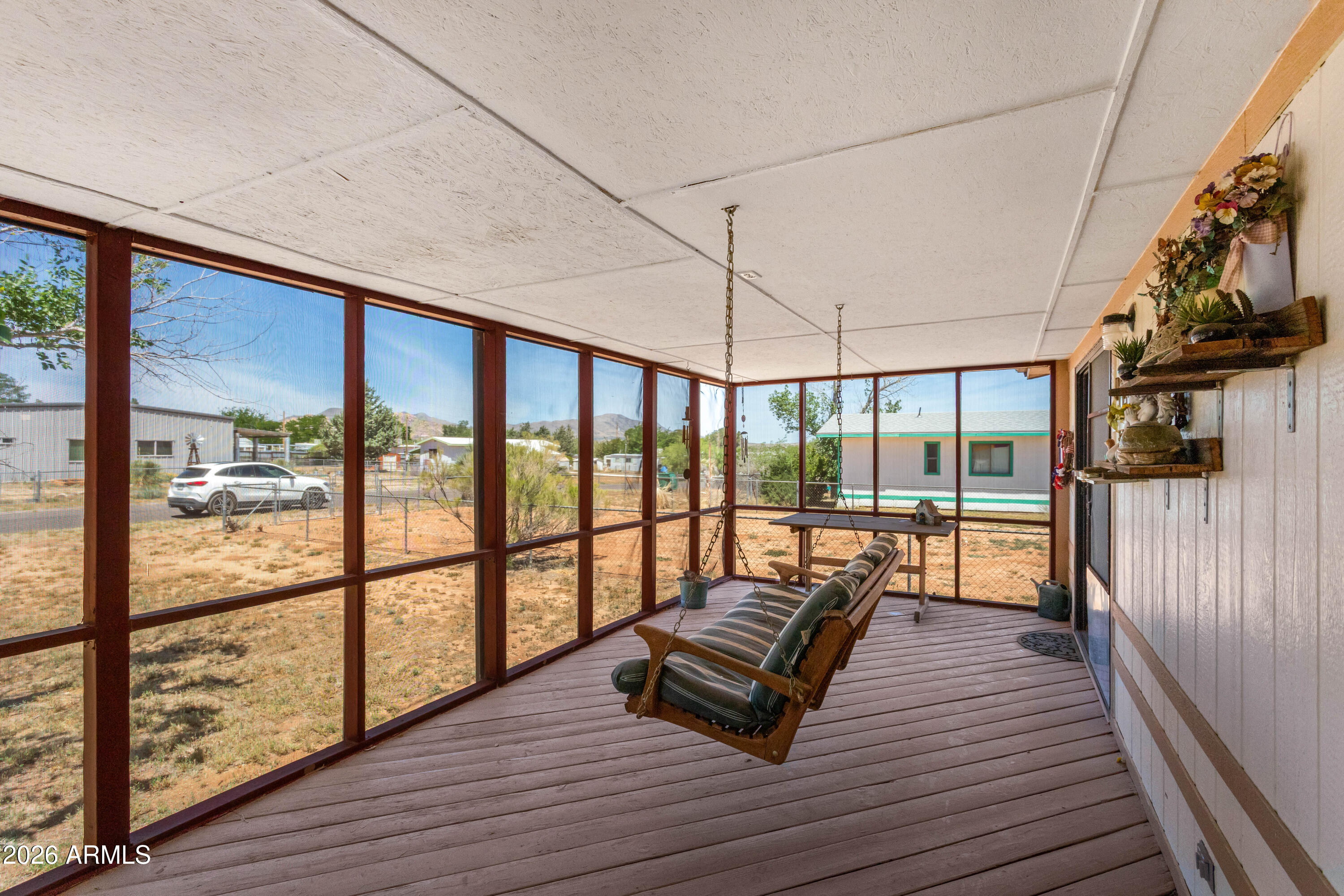 1935 North Tortoise Trail Dragoon, AZ 85609 - Photo 4 of 38 a view of balcony with couch and wooden floor