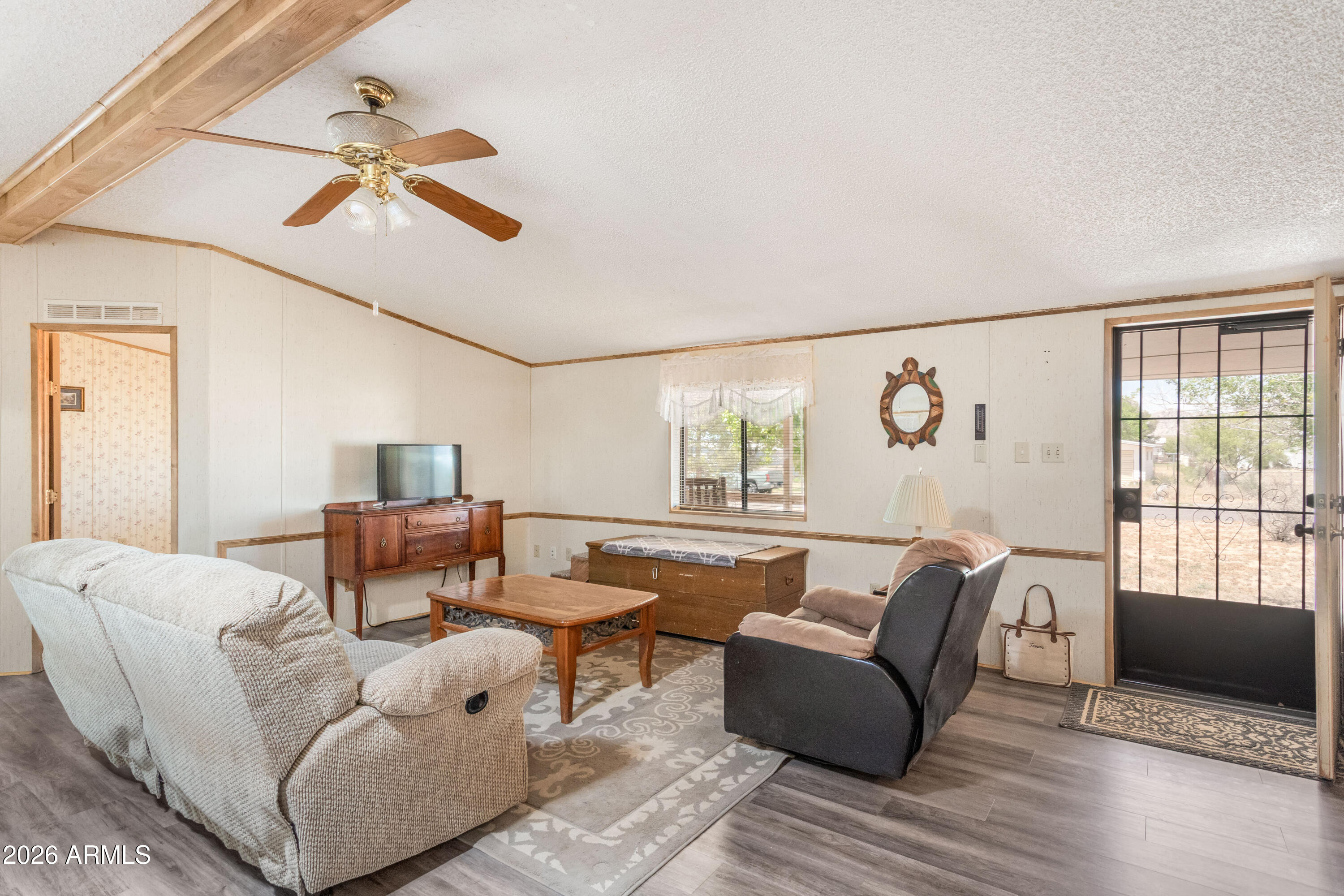 1935 North Tortoise Trail Dragoon, AZ 85609 - Photo 5 of 38 a living room with furniture and windows