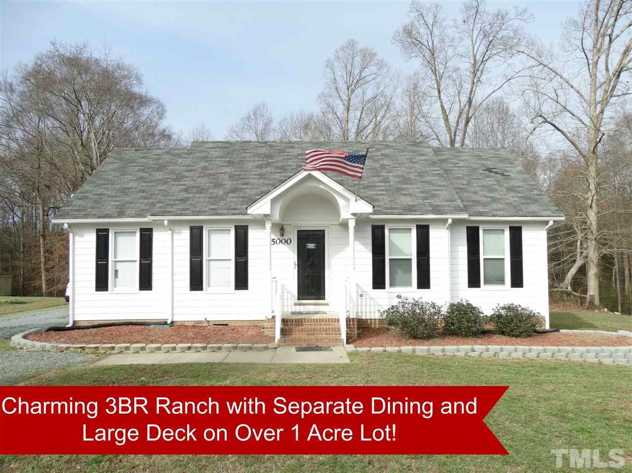 5000 Raleigh Road Benson, NC 27504 - Photo 1 of 25 a front view of a house with a yard