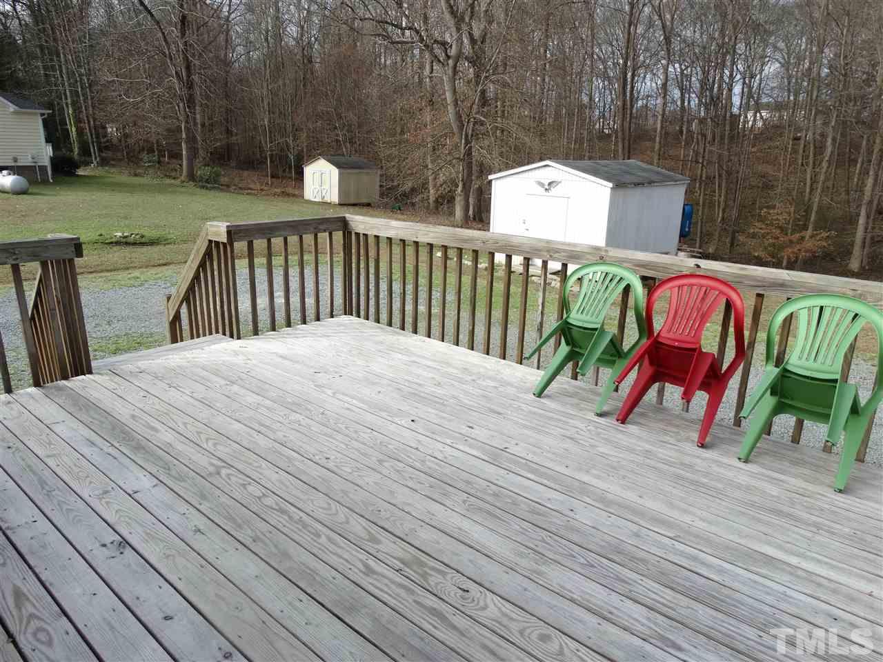 5000 Raleigh Road Benson, NC 27504 - Photo 21 of 25 a terrace view with sitting space and trees