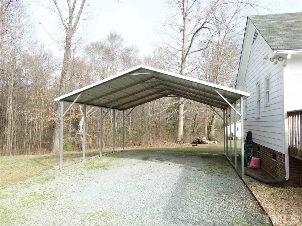 5000 Raleigh Road Benson, NC 27504 - Photo 24 of 25 a view of backyard with small cabin