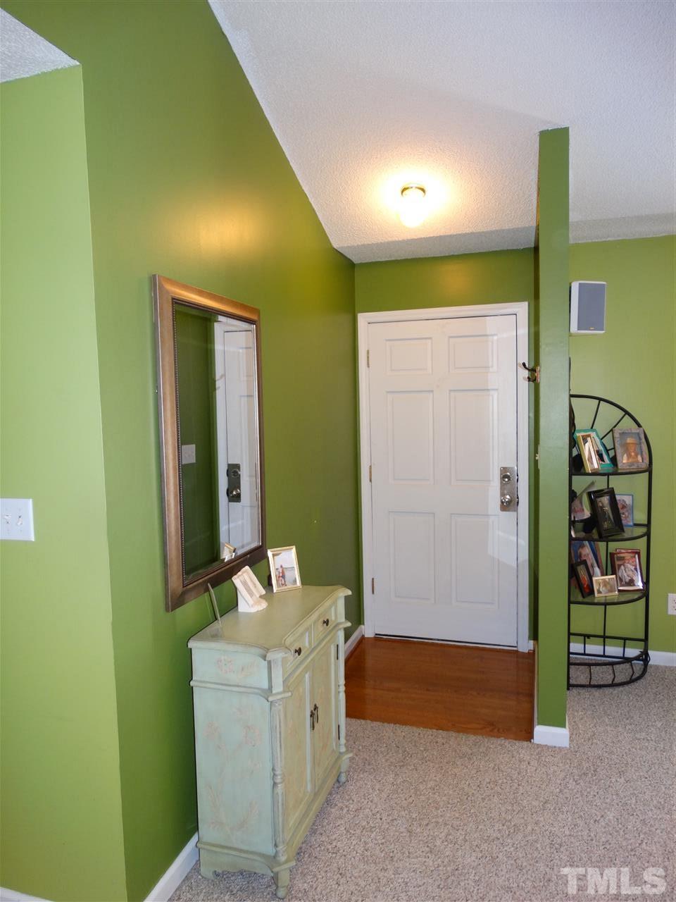 5000 Raleigh Road Benson, NC 27504 - Photo 6 of 25 a bathroom with a sink and a mirror