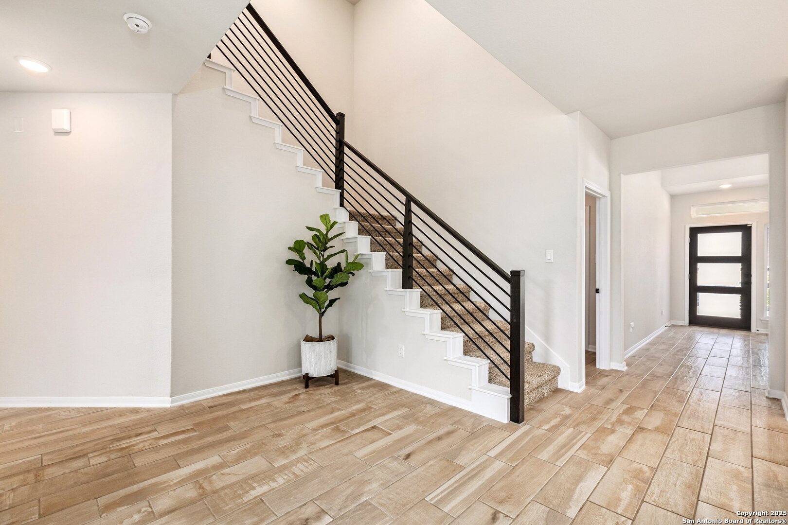 1707 Lawnside Road San Antonio, TX 78245 - Photo 14 of 64 a view of a hallway view with staircase