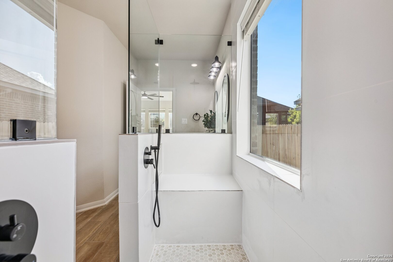 1707 Lawnside Road San Antonio, TX 78245 - Photo 28 of 64 a bathroom with a bathtub and shower