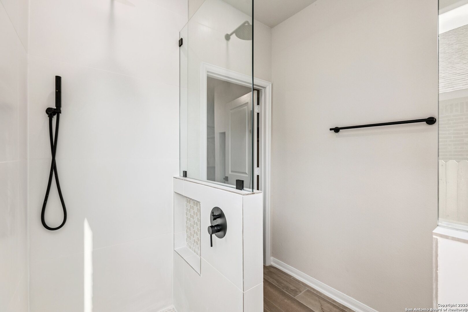 1707 Lawnside Road San Antonio, TX 78245 - Photo 29 of 64 a bathroom with a shower