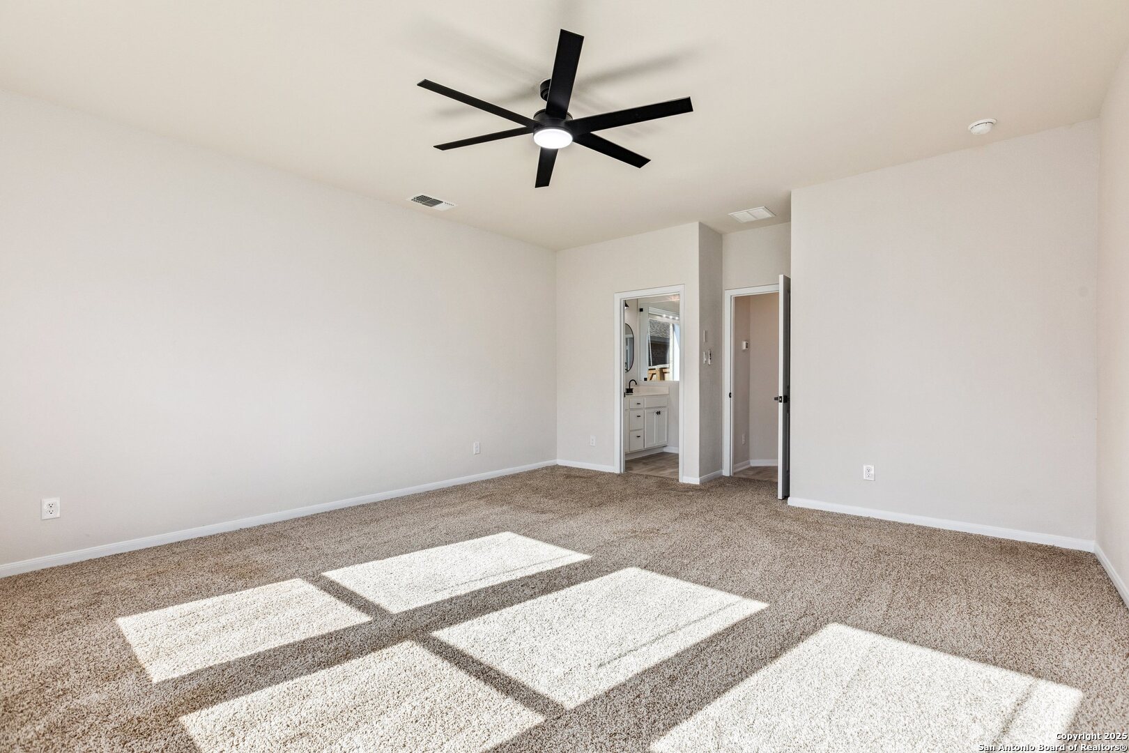 1707 Lawnside Road San Antonio, TX 78245 - Photo 40 of 64 a view of a livingroom with a ceiling fan and window