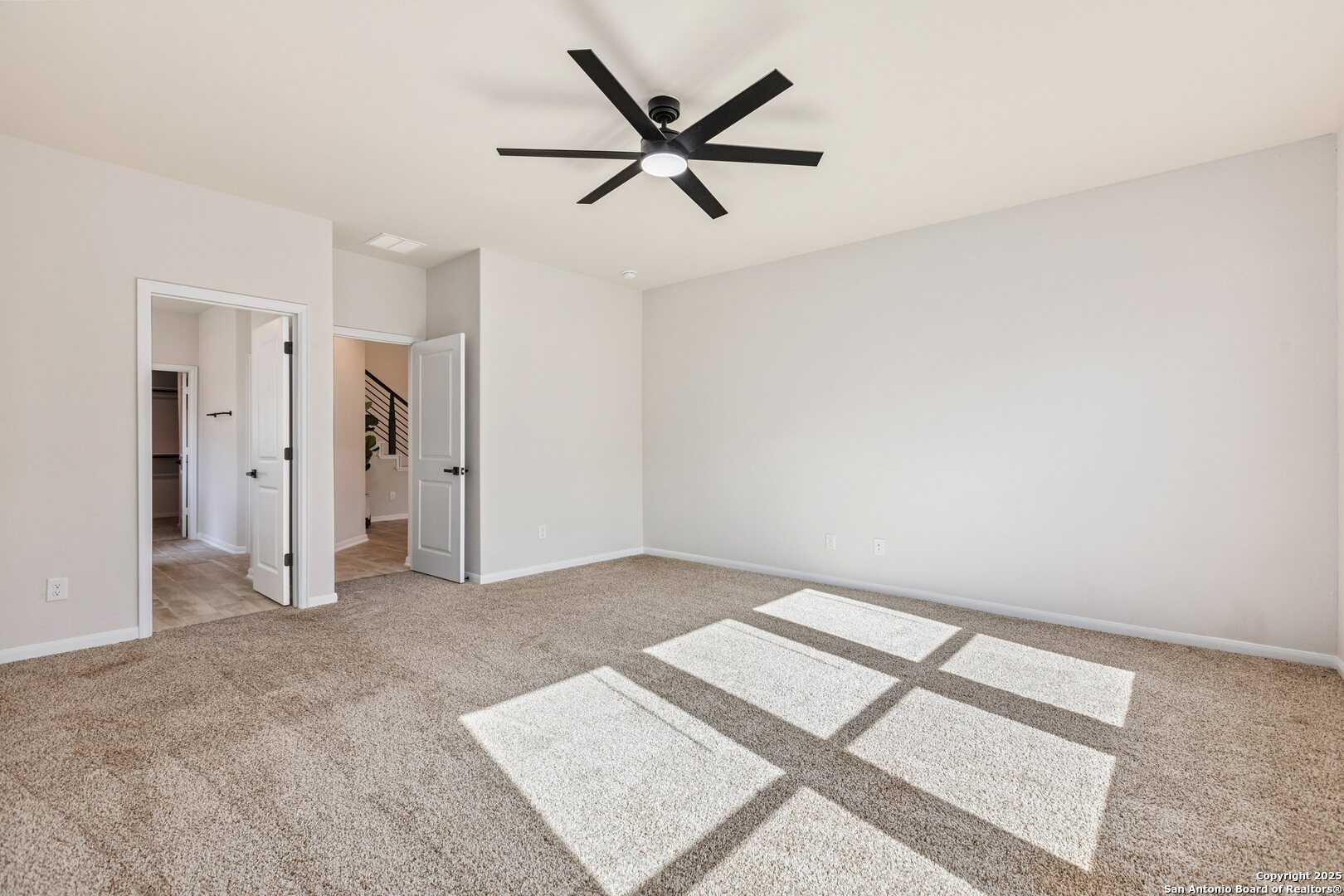1707 Lawnside Road San Antonio, TX 78245 - Photo 41 of 64 an empty room with closet and ceiling fan