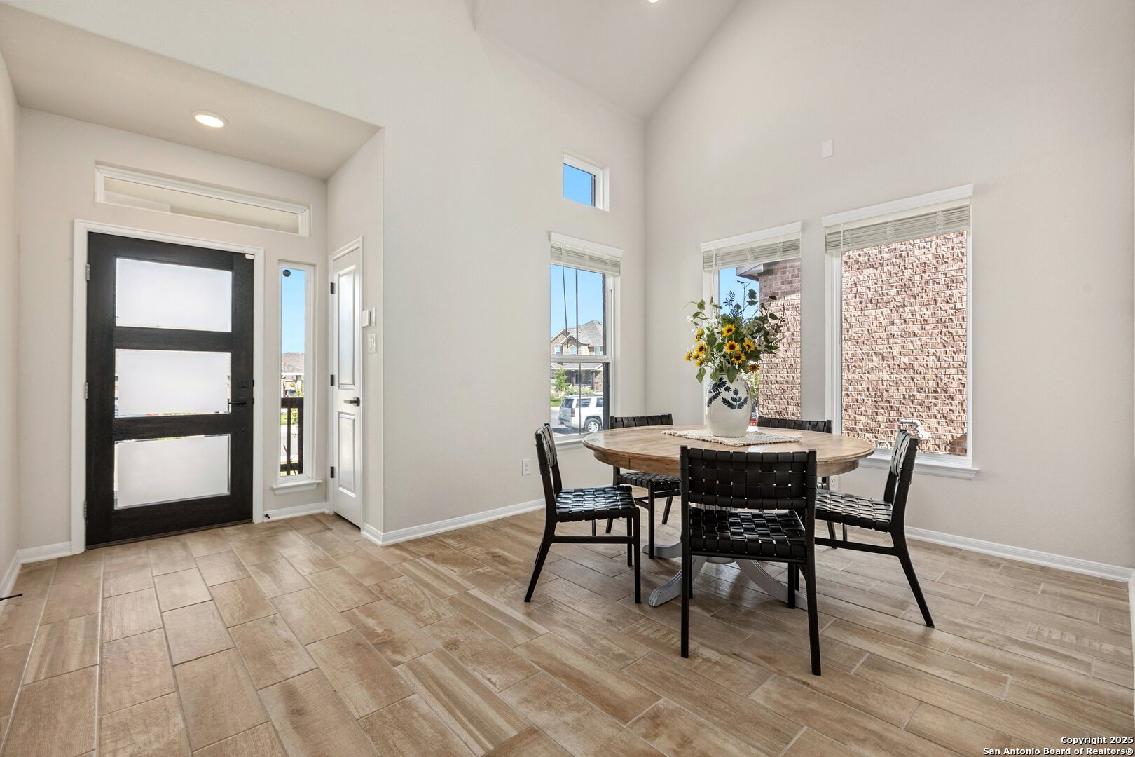 1707 Lawnside Road San Antonio, TX 78245 - Photo 8 of 64 a view of a dining room with furniture and window