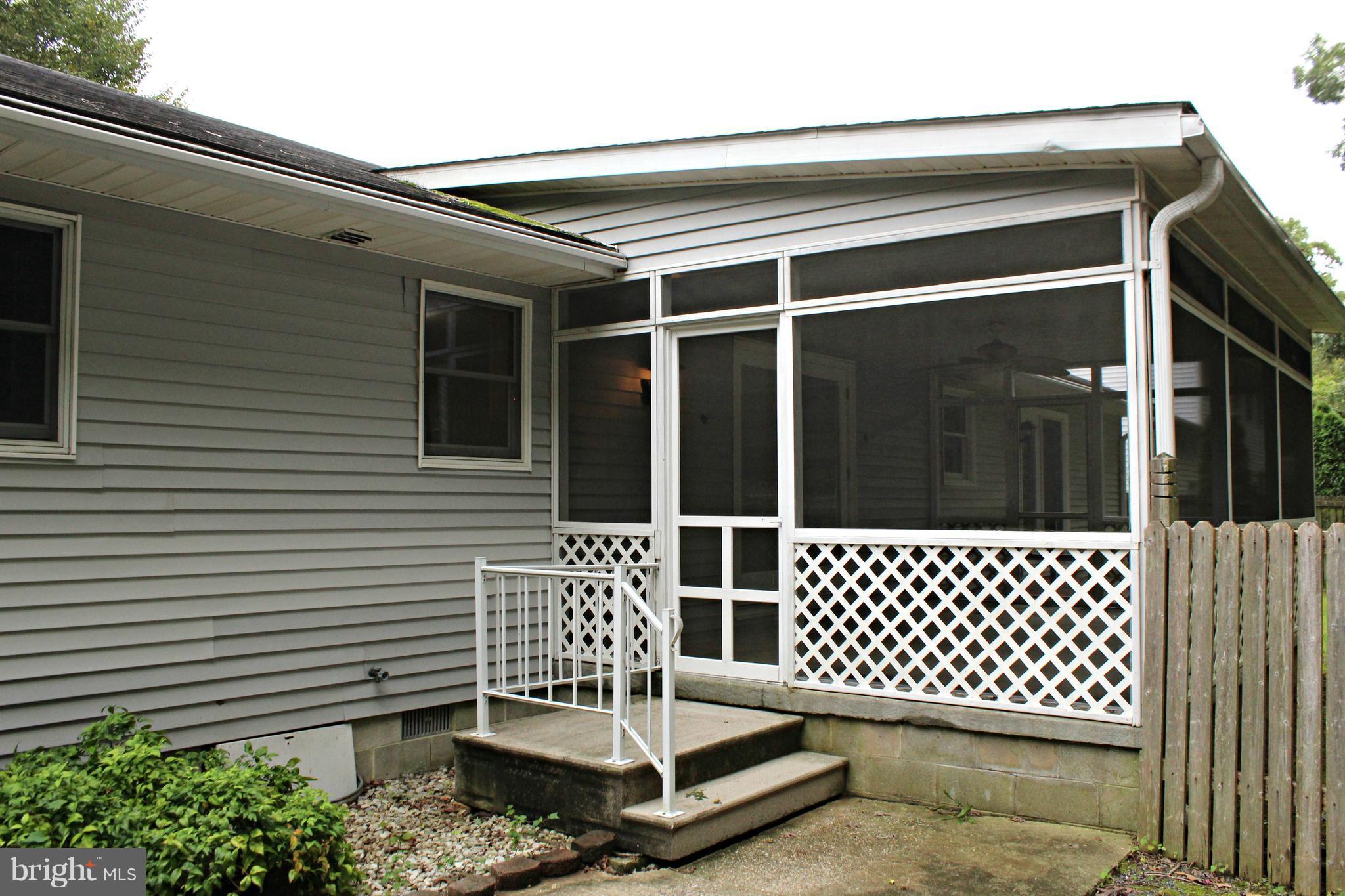 7054 Pine Ridge Road Easton, MD 21601 - Photo 27 of 30 Enjoy the large screened porch!