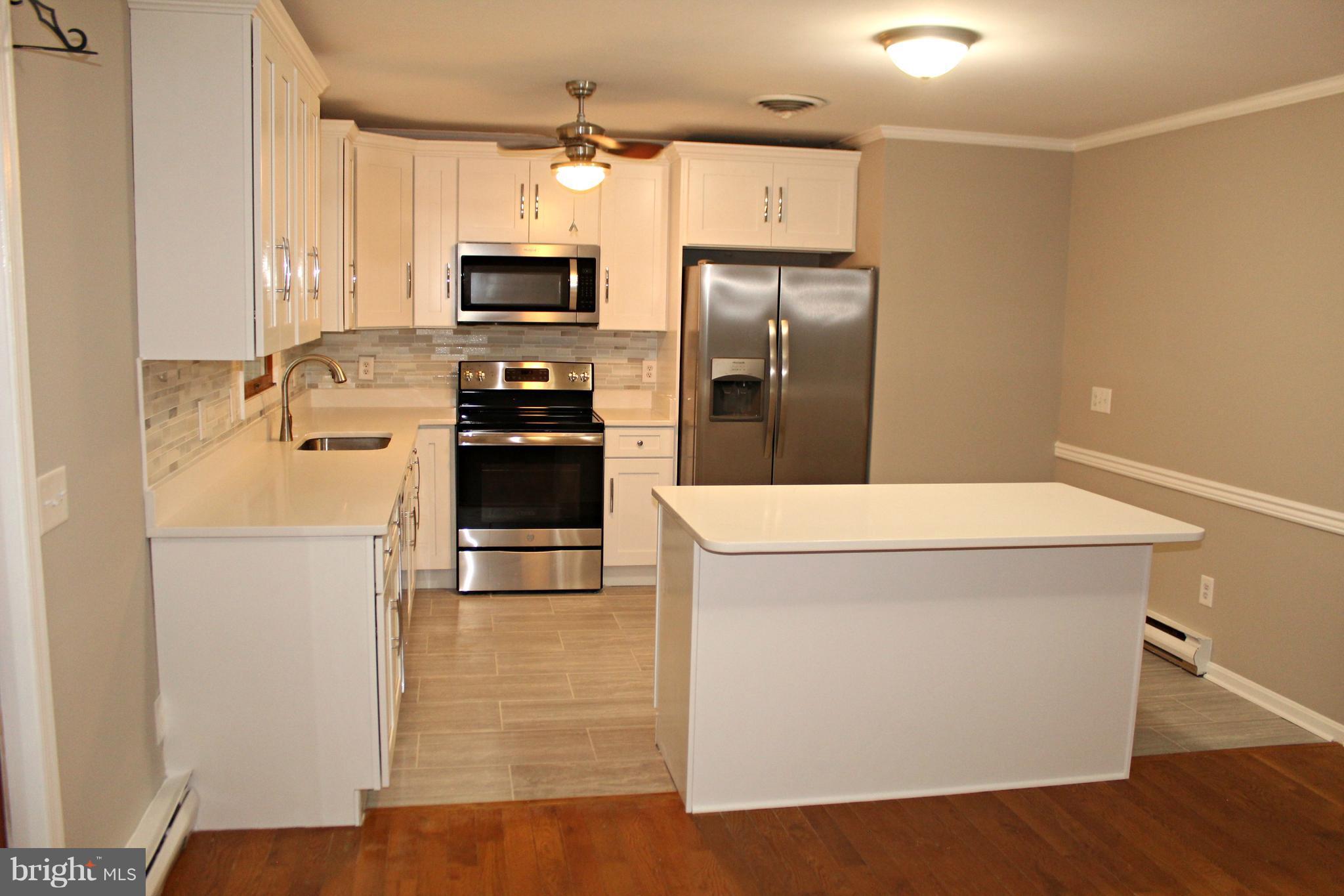 7054 Pine Ridge Road Easton, MD 21601 - Photo 5 of 30 New kitchen with stainless steel appliances!