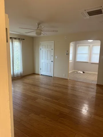 a view of an empty room and window