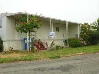 552 El Portal Way, Unit 552 Santa Rosa, CA 95407 - Photo 1 of 1 a front view of a house with garden