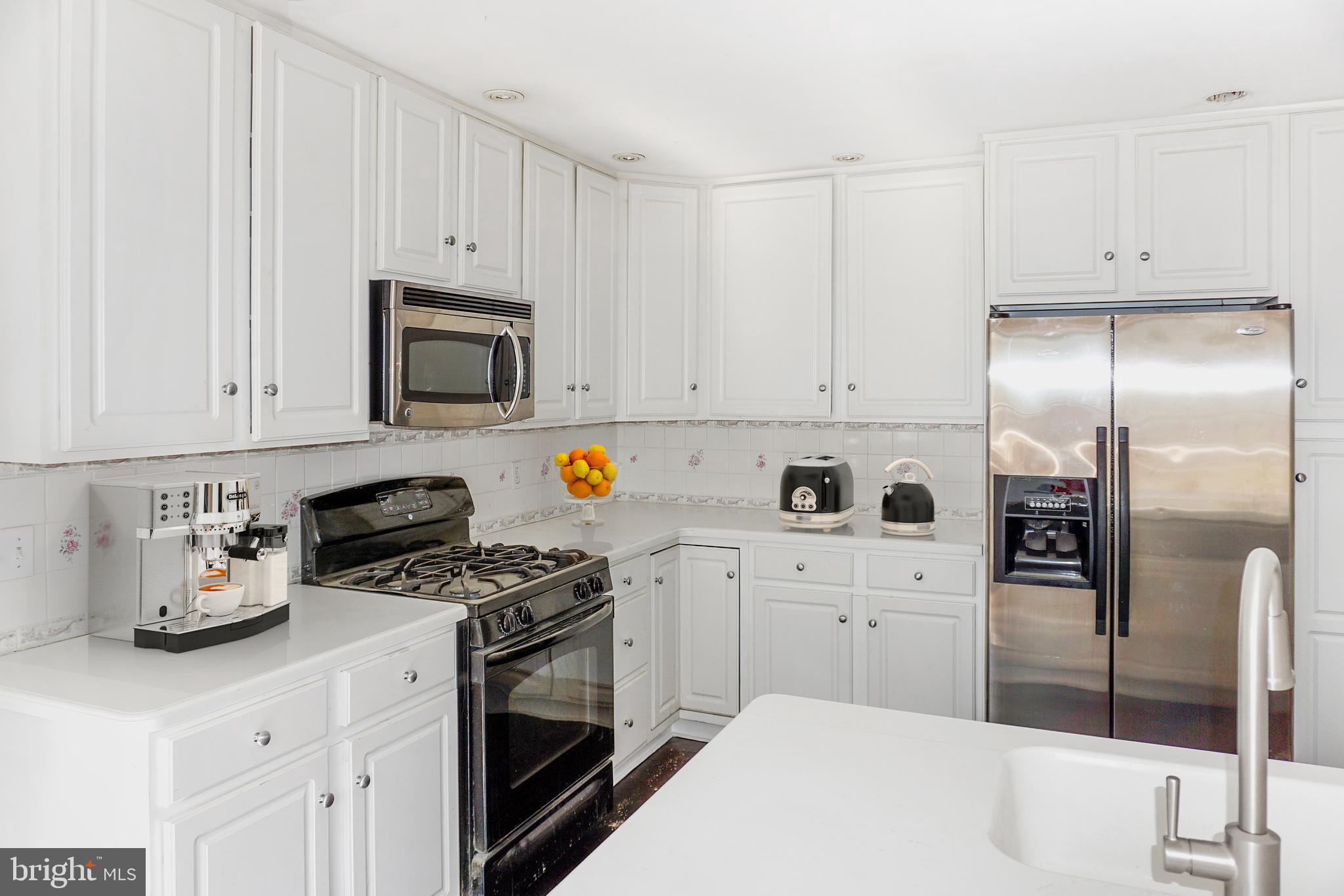 248 Hilldale Road Villanova, PA 19085 - Photo 1 of 21 a kitchen with cabinets and appliances