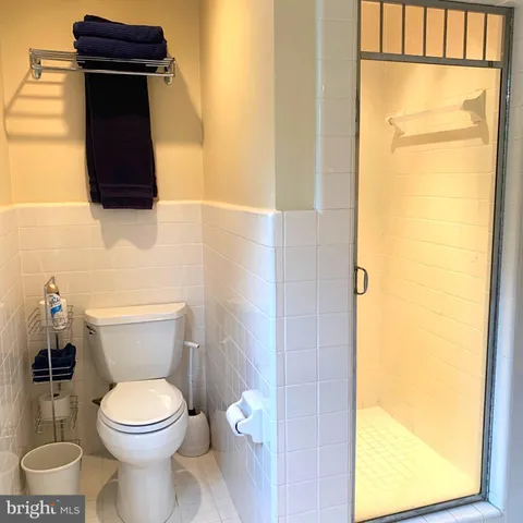 a bathroom with a toilet and a sink