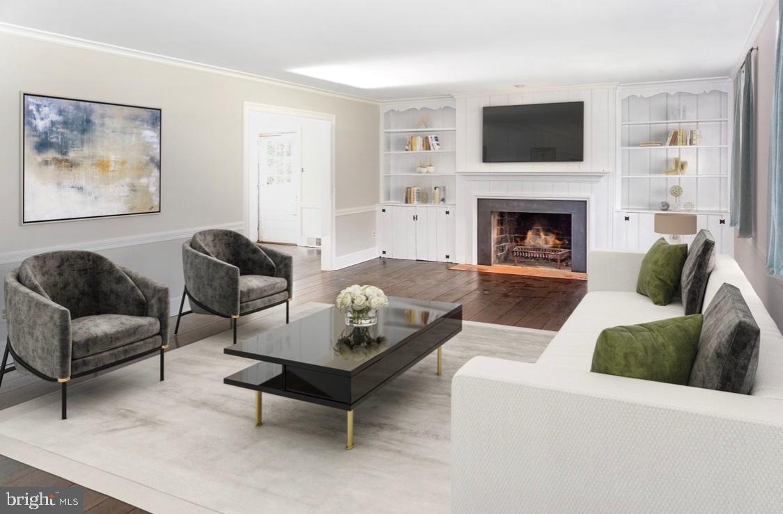 248 Hilldale Road Villanova, PA 19085 - Photo 5 of 21 a living room with furniture and a fireplace