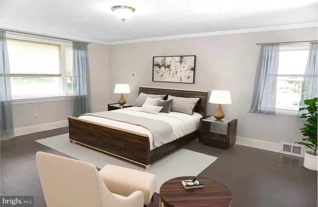 a bedroom with bed and a window