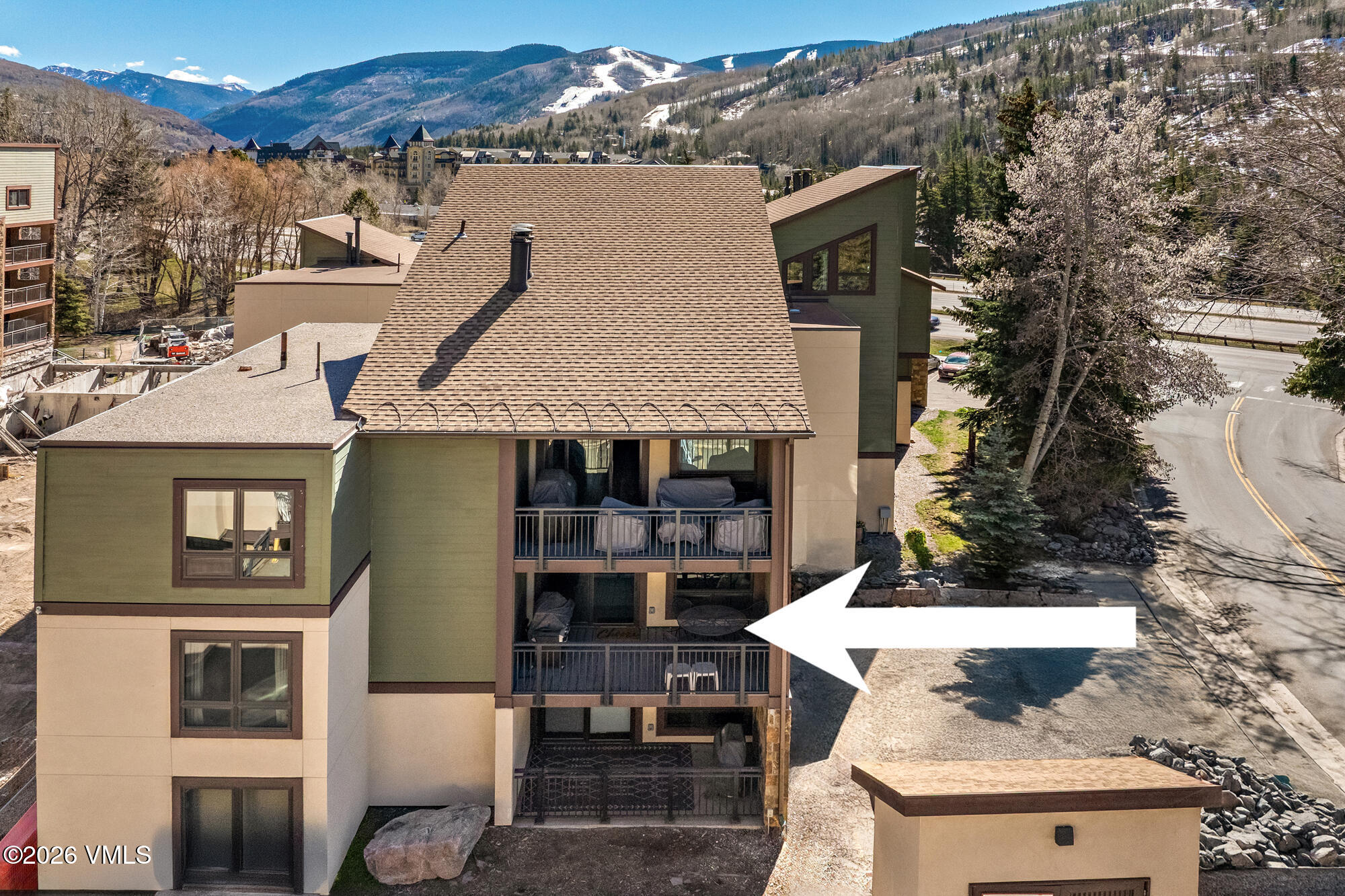 963 Lions Ridge Loop, Unit 502 Vail, CO 81657 - Photo 28 of 30 aerial view of a house with a yard