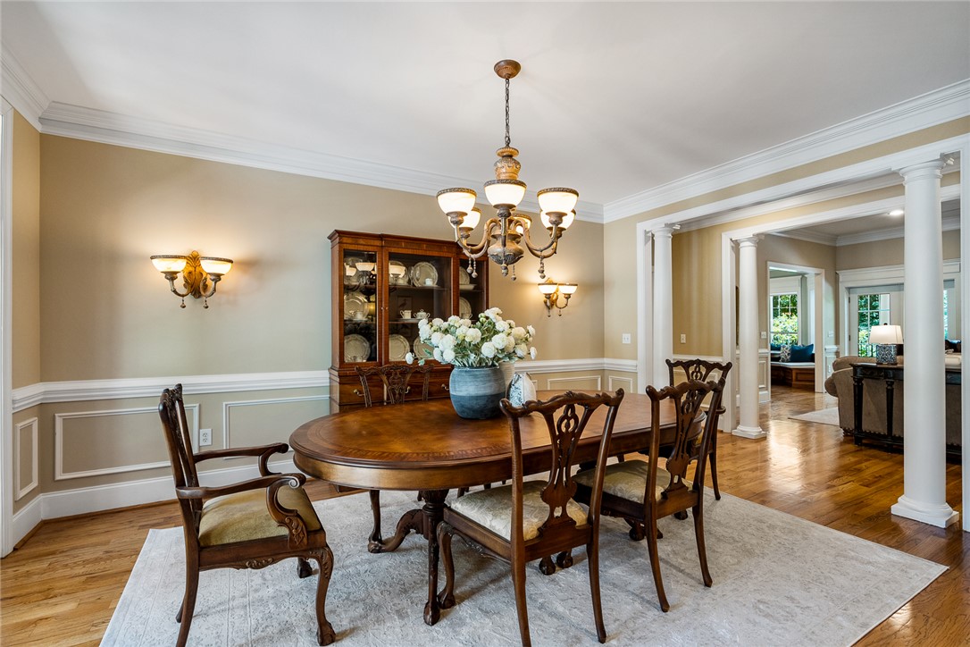 200 Graylyn Drive Anderson, SC 29621 - Photo 6 of 48 Elegant crown molding and rich hardwood floors define this distinguished formal dining space.