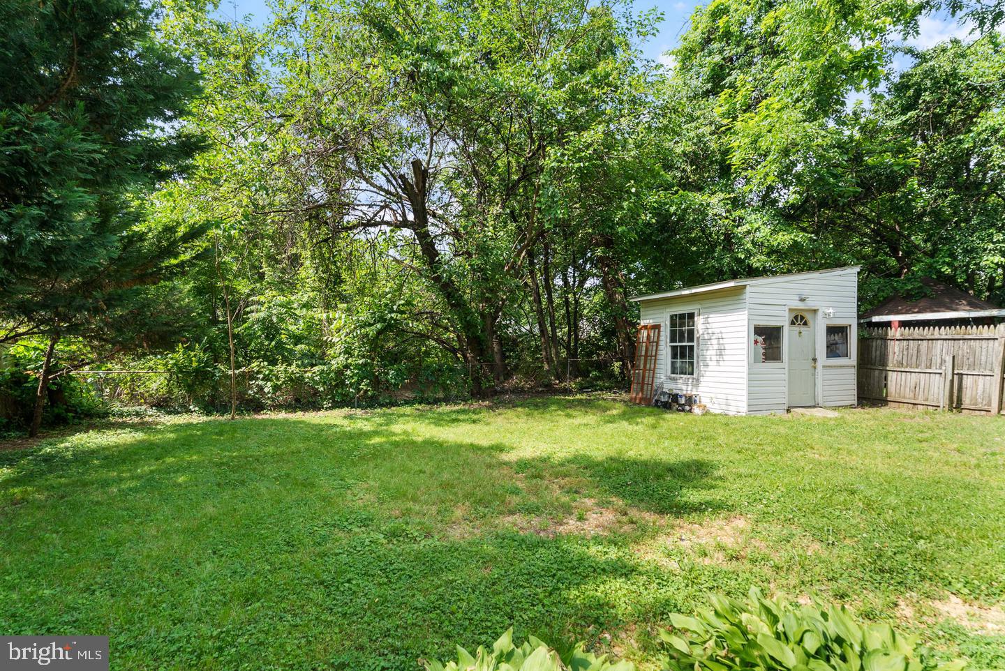 5415 Powhatan Road Riverdale, MD 20737 - Photo 22 of 24 Fenced in backyard with shed