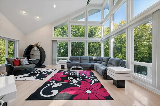 a view of a dining room with furniture window and outside view