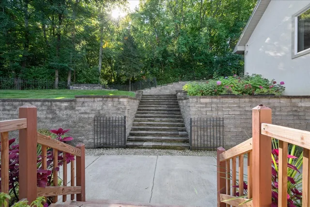 a bathroom with a shower and a bath tub