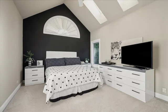 a view of a patio with a table and chairs