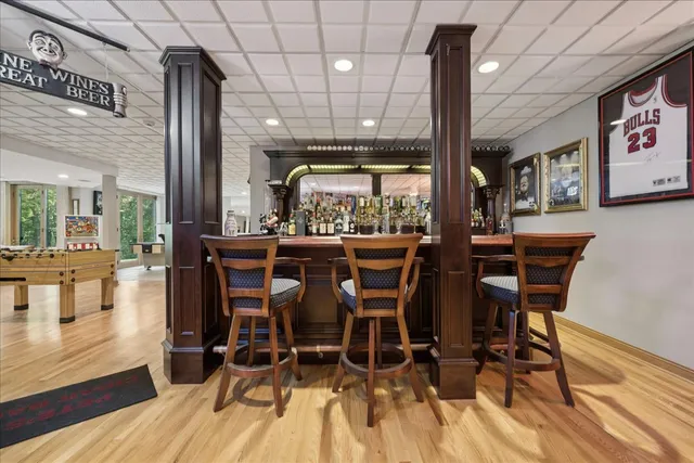 an aerial view of residential house with outdoor space and lake view