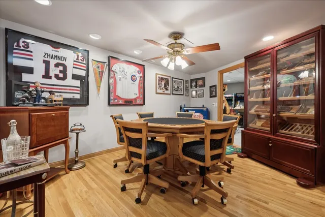 an aerial view of lake residential house with outdoor space and trees all around